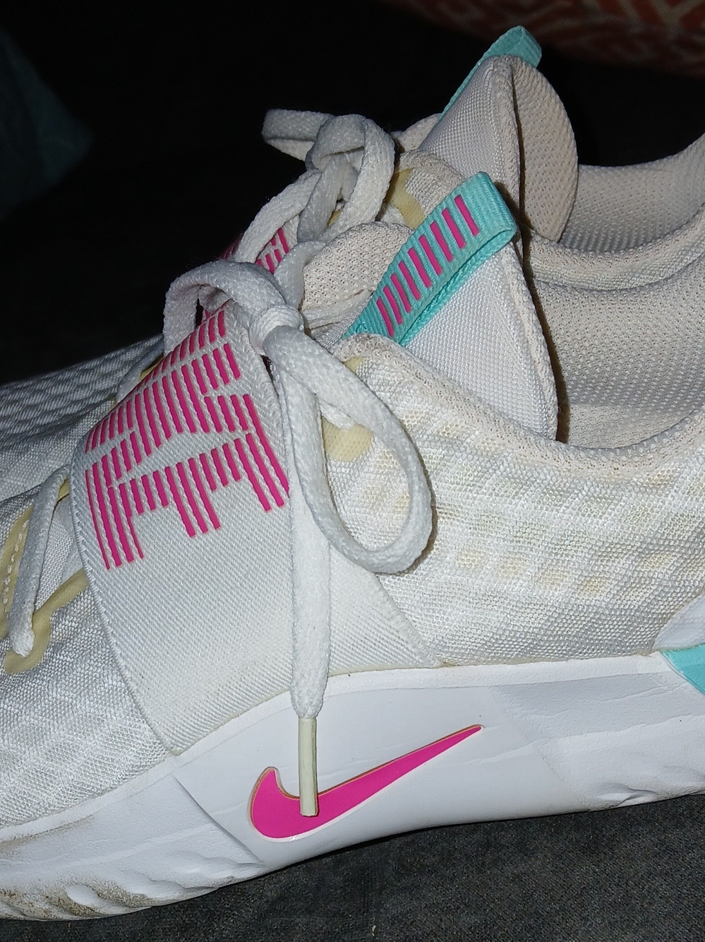 Nike Women’s White Athletic Sneakers with Pink Accents